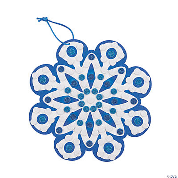 Blue and white snowflake design on a transparent background