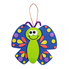 Colorful butterfly-shaped craft with a smiley face on a white background
