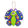 Colorful butterfly-shaped craft with a smiley face on a white background