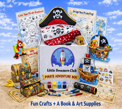 Pirate-themed craft kit with supplies and activities on a wooden surface.