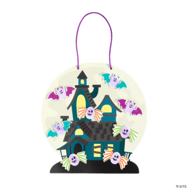 Halloween-themed craft with a haunted house design on a white background