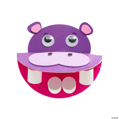 Purple hippo-shape craft with chompers and googly eyes on a transparent background