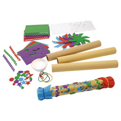 Assorted craft supplies including paper, ribbons, and decorative items on a white background to create a rain stick