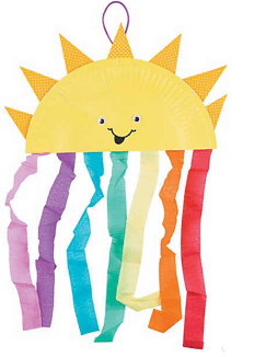 Sun-shaped craft with colorful ribbons hanging from it