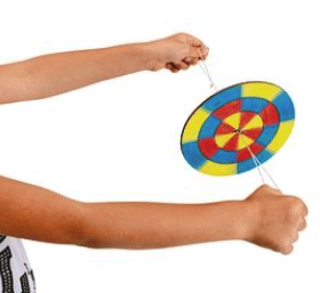 Person holding a colorful spinning disc on a white background