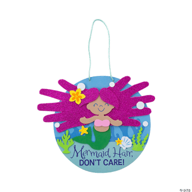 Decorative hand-print craft with mermaid design and text 'Mermaid Hair, Don't Care!' on a clear background