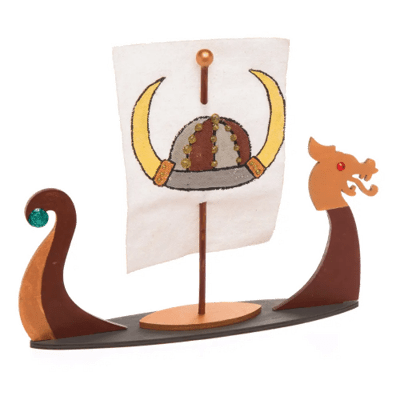 Viking ship model with a flag featuring a helmet design on a white background