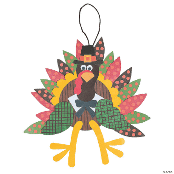 Colorful turkey-shaped craft on a green background