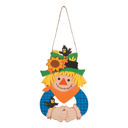 Decorative scarecrow with sunflower hat and birds on a clear background