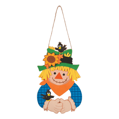 Decorative scarecrow with sunflower hat and birds on a clear background