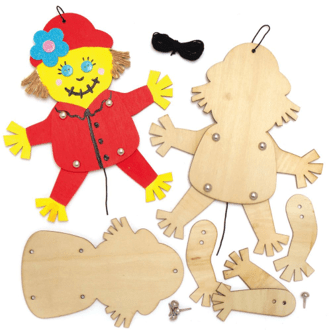 Wooden scarecrow puppet craft with parts on a white background