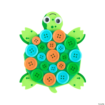 Green turtle adorned with colorful buttons on its shell