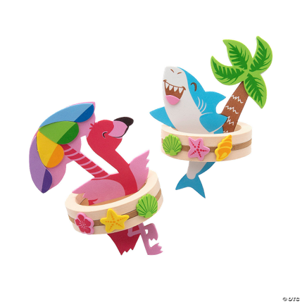 Blue shark and pink flamingo in inner tubes on a white background
