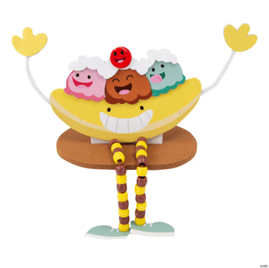 Yellow banana split ice cream character with dangling beaded  legs on a white background