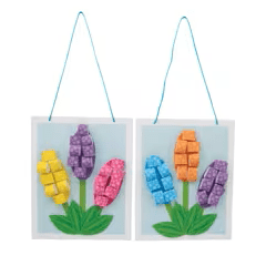 Colorful Paper Flower Sign Craft on a white background.