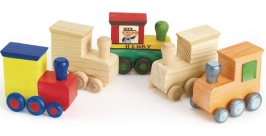 Wooden  train set with colorful cars on a white background