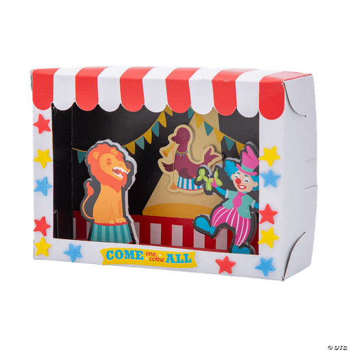 Carnival-themed cardboard craft with colorful decorations and cut-out figures of a lion, clown, and other performers.