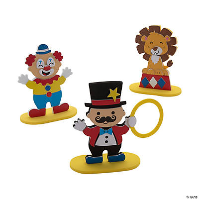 Set of colorful circus-themed figures including a clown, lion, and ringmaster on a white background.
