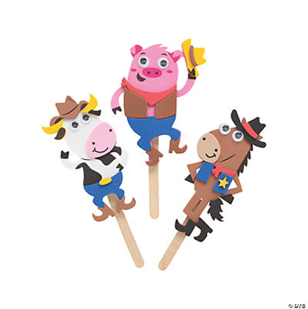 Three colorful farm animal cowboy-themed character crafts on sticks against a white background