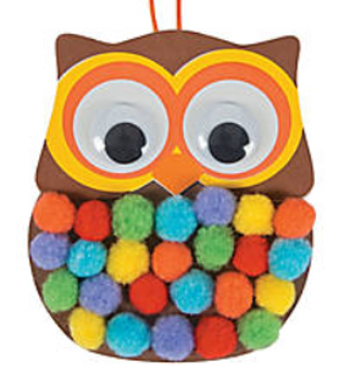 Colorful owl craft with pom-pom details on a white background