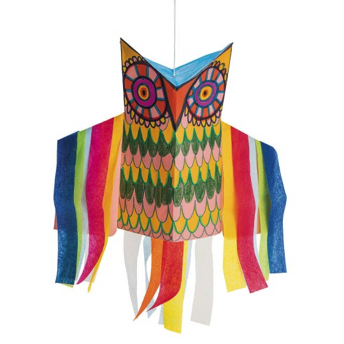 Colorful owl-shaped kite with striped body and colorful streamers on a white background